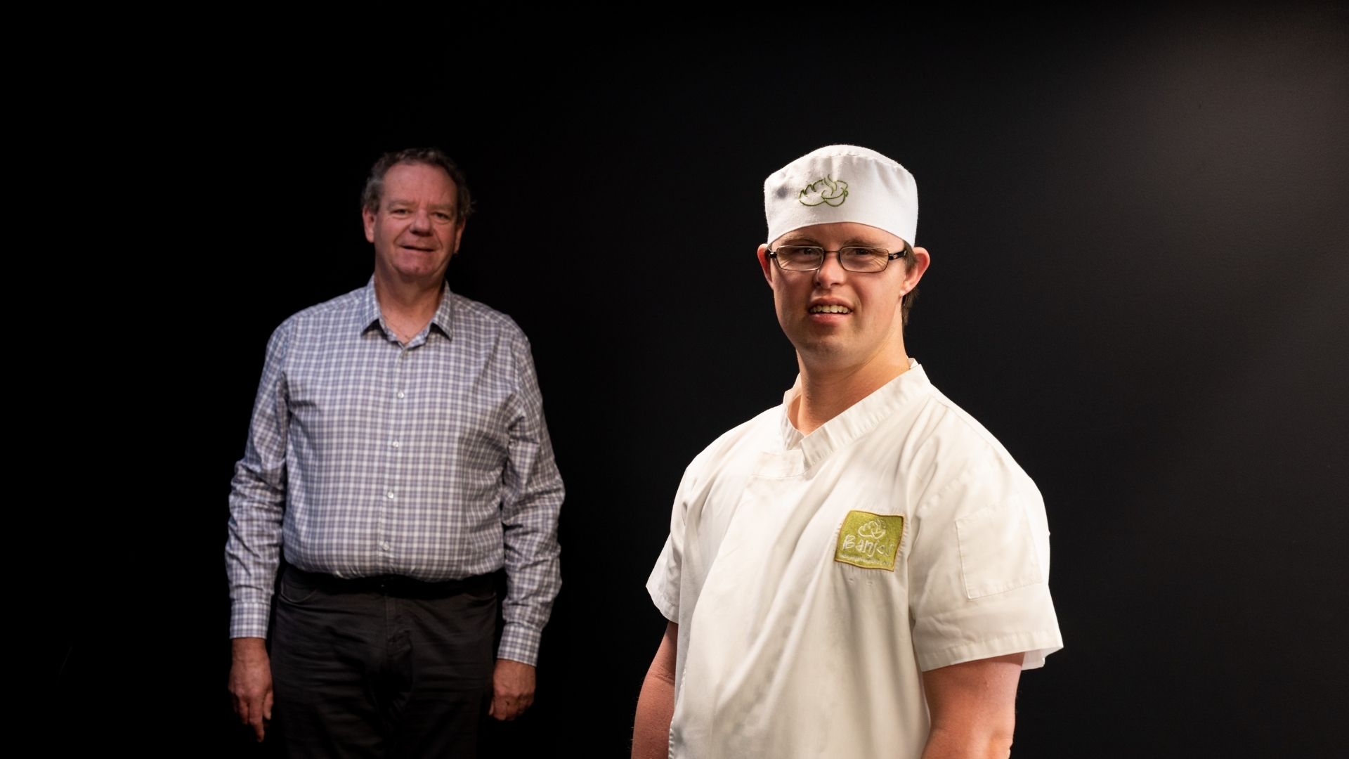 Aran is wearing his Banjo&rsquo;s Longford uniform and standing next to his manager Zac.