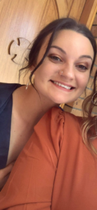 Portrait photo of Marni, dark haired women smiling