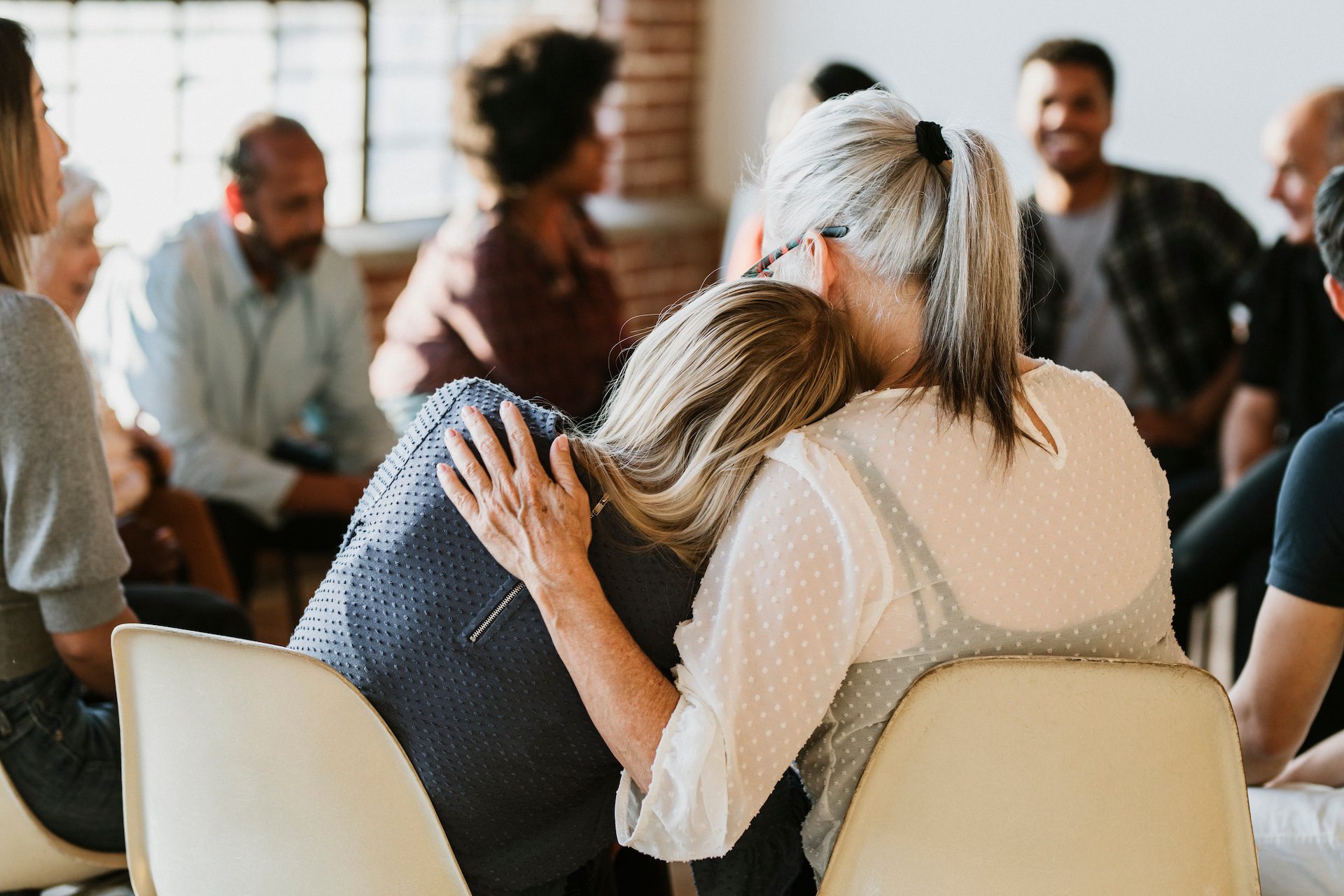 People supporting each other during a rehabilitation session.