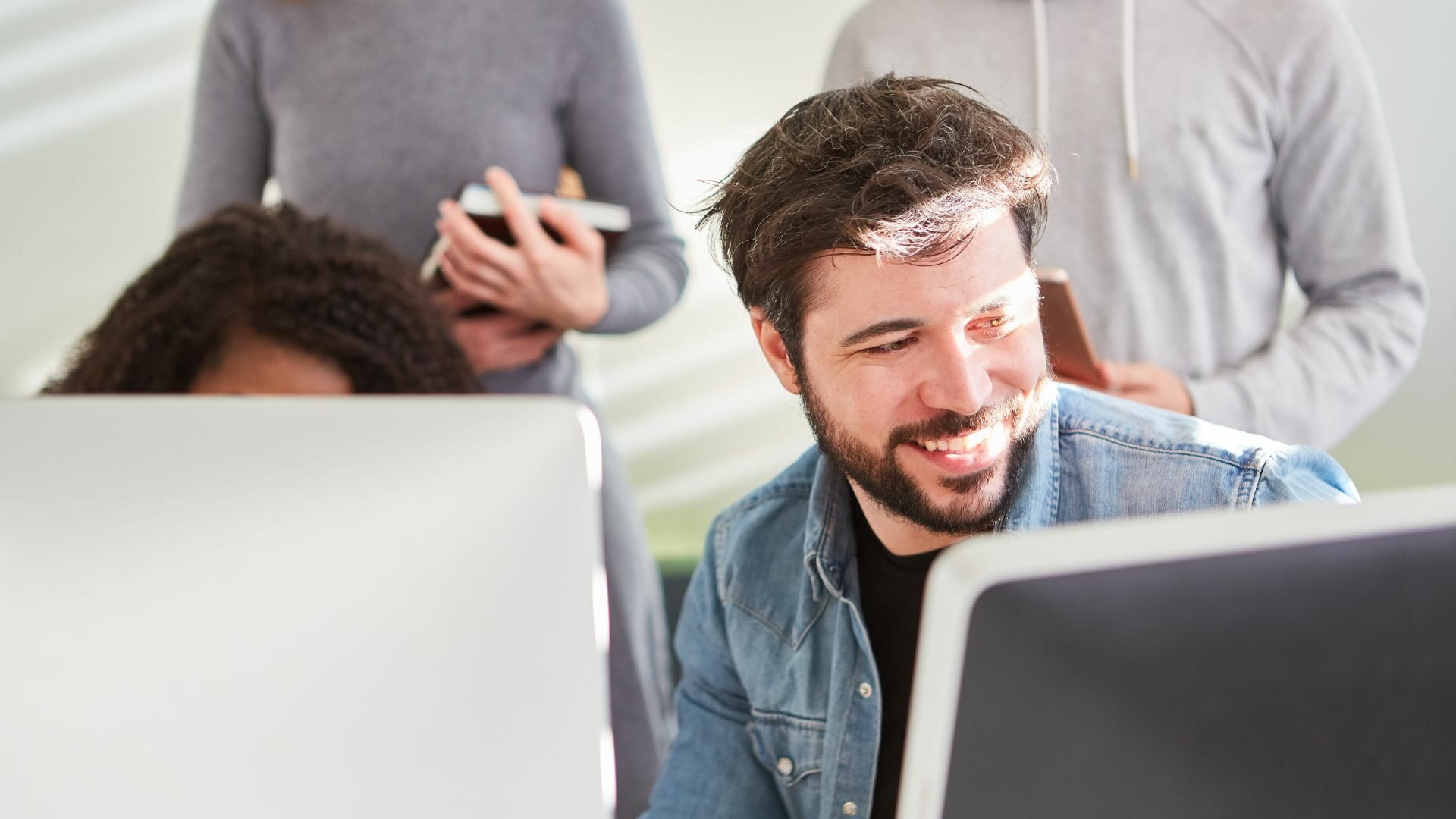 A man working with a group of people.
